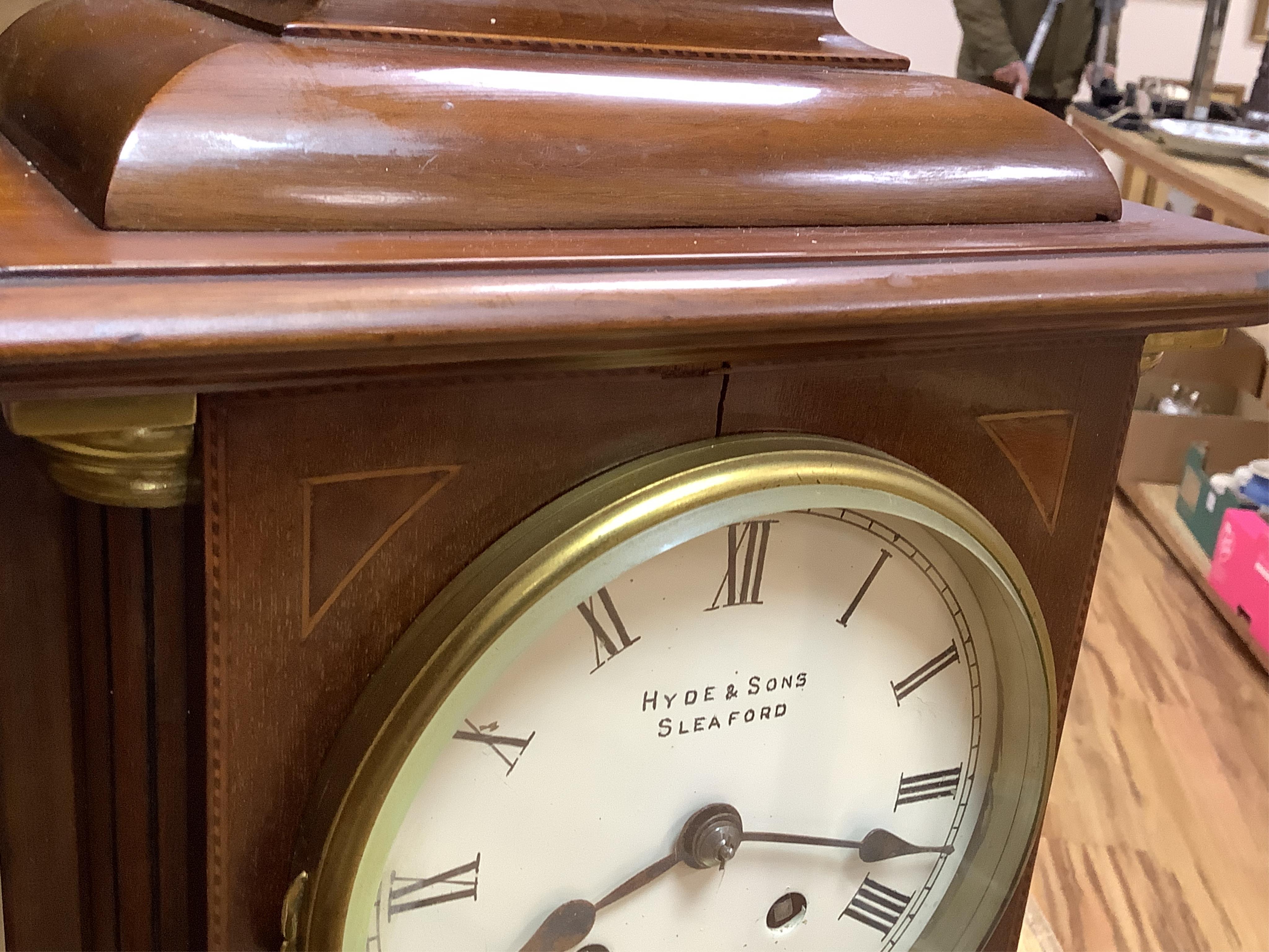 An early 20th century mahogany mantel clock, the dial inscribed Hyde & Sons, Sleaford, 41cm high